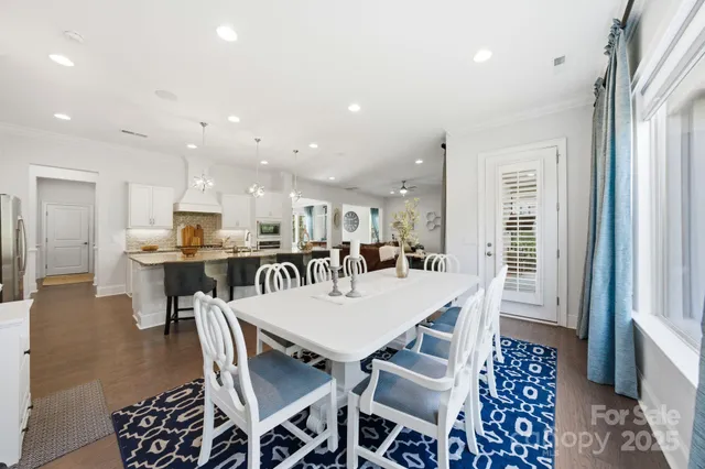 a bedroom with a bed and a chair