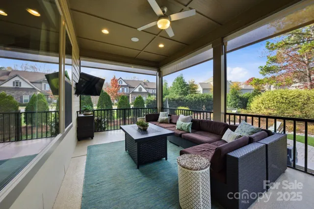 a view of a house with backyard sitting area and garden