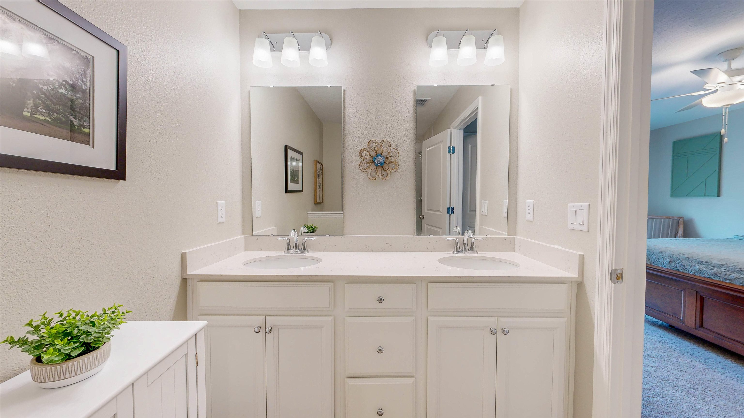 96 Bramble Court St. Augustine, FL 32092 - Photo 24 of 61 a bathroom with a sink and a mirror
