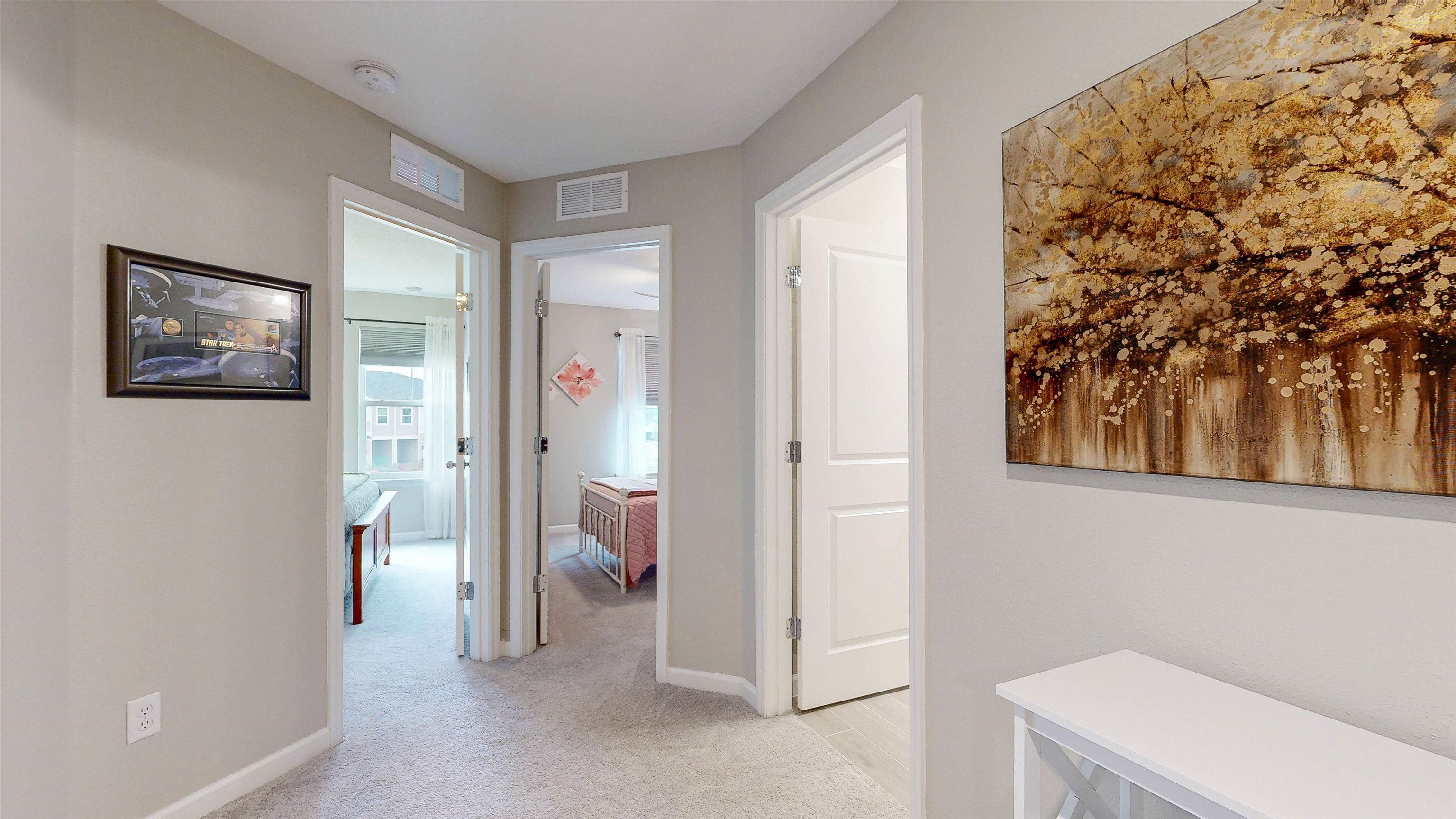 96 Bramble Court St. Augustine, FL 32092 - Photo 32 of 61 a view of a bathroom with a sink and a mirror