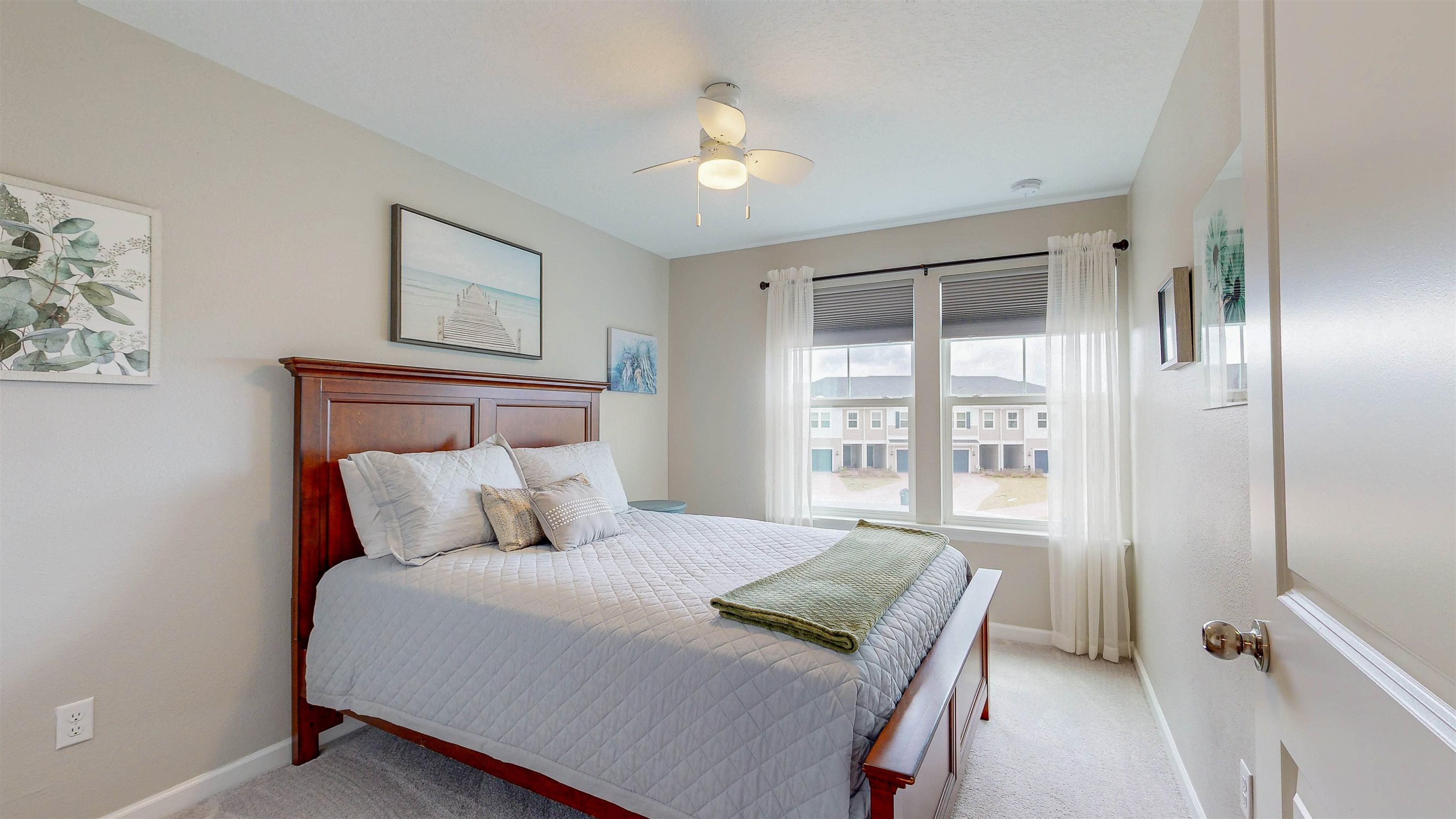 96 Bramble Court St. Augustine, FL 32092 - Photo 33 of 61 a bedroom with a bed and a window