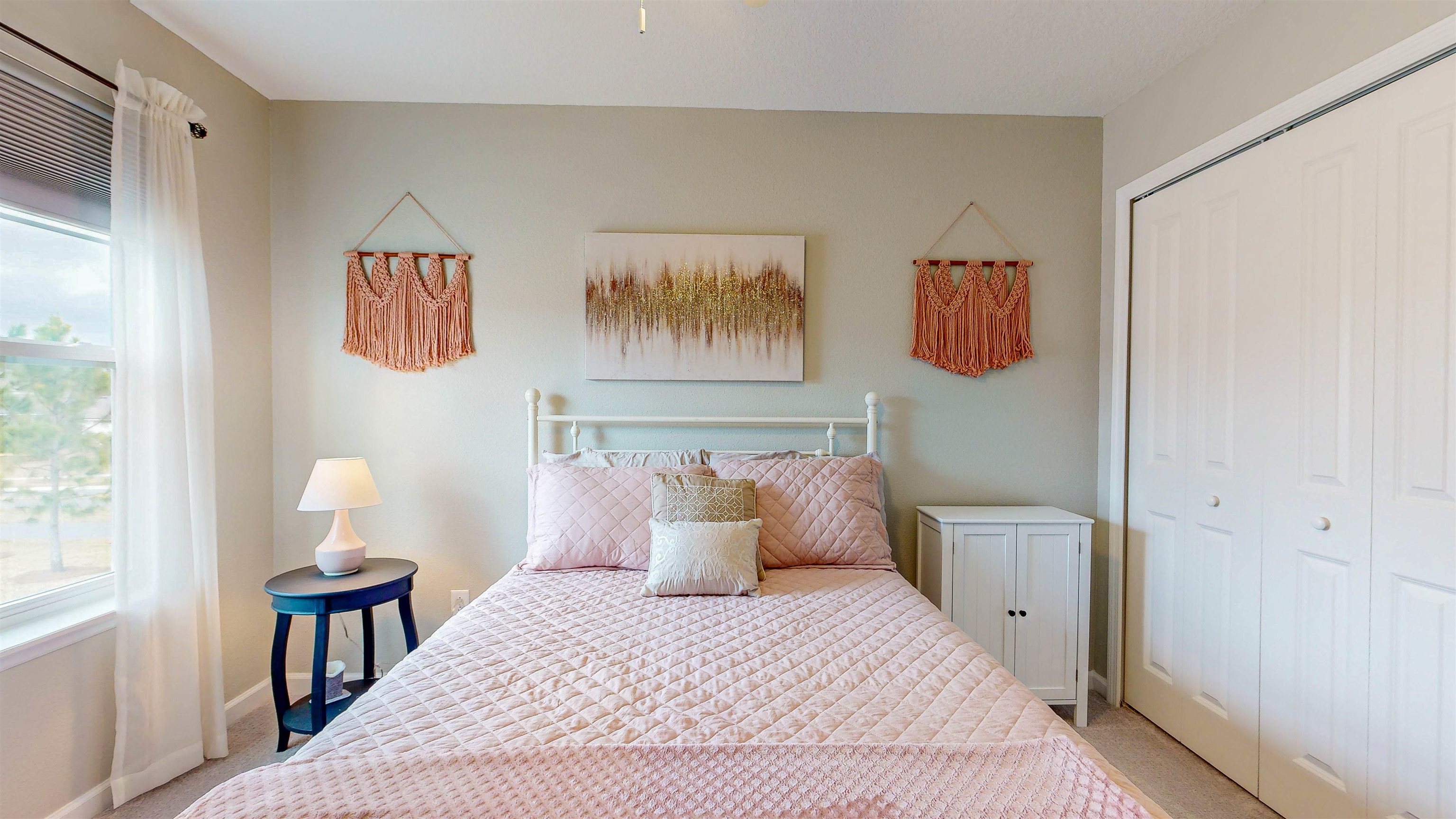 96 Bramble Court St. Augustine, FL 32092 - Photo 37 of 61 a bedroom with a bed and wooden floor