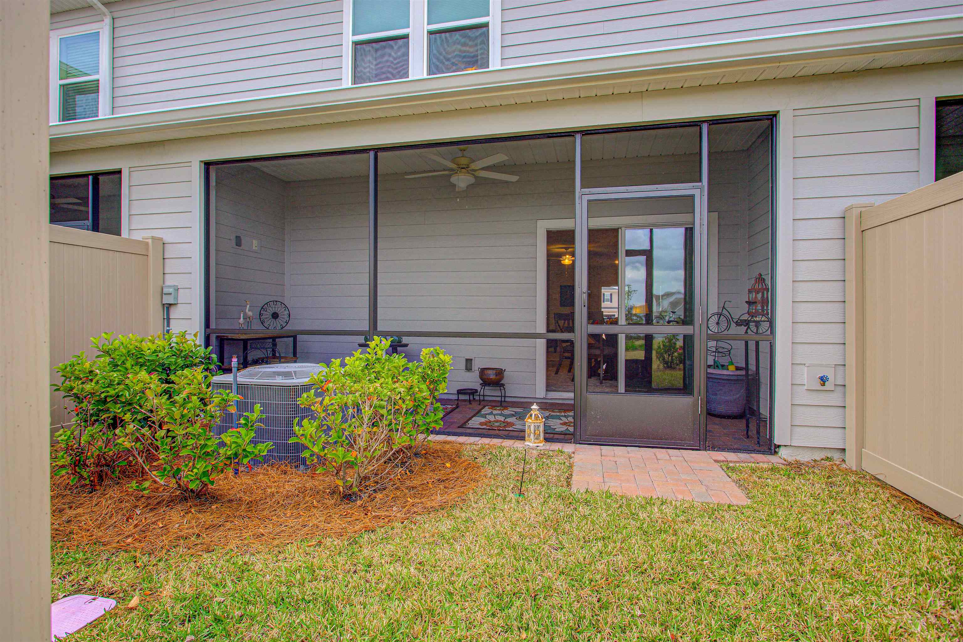 96 Bramble Court St. Augustine, FL 32092 - Photo 42 of 61 a front view of a house with garden