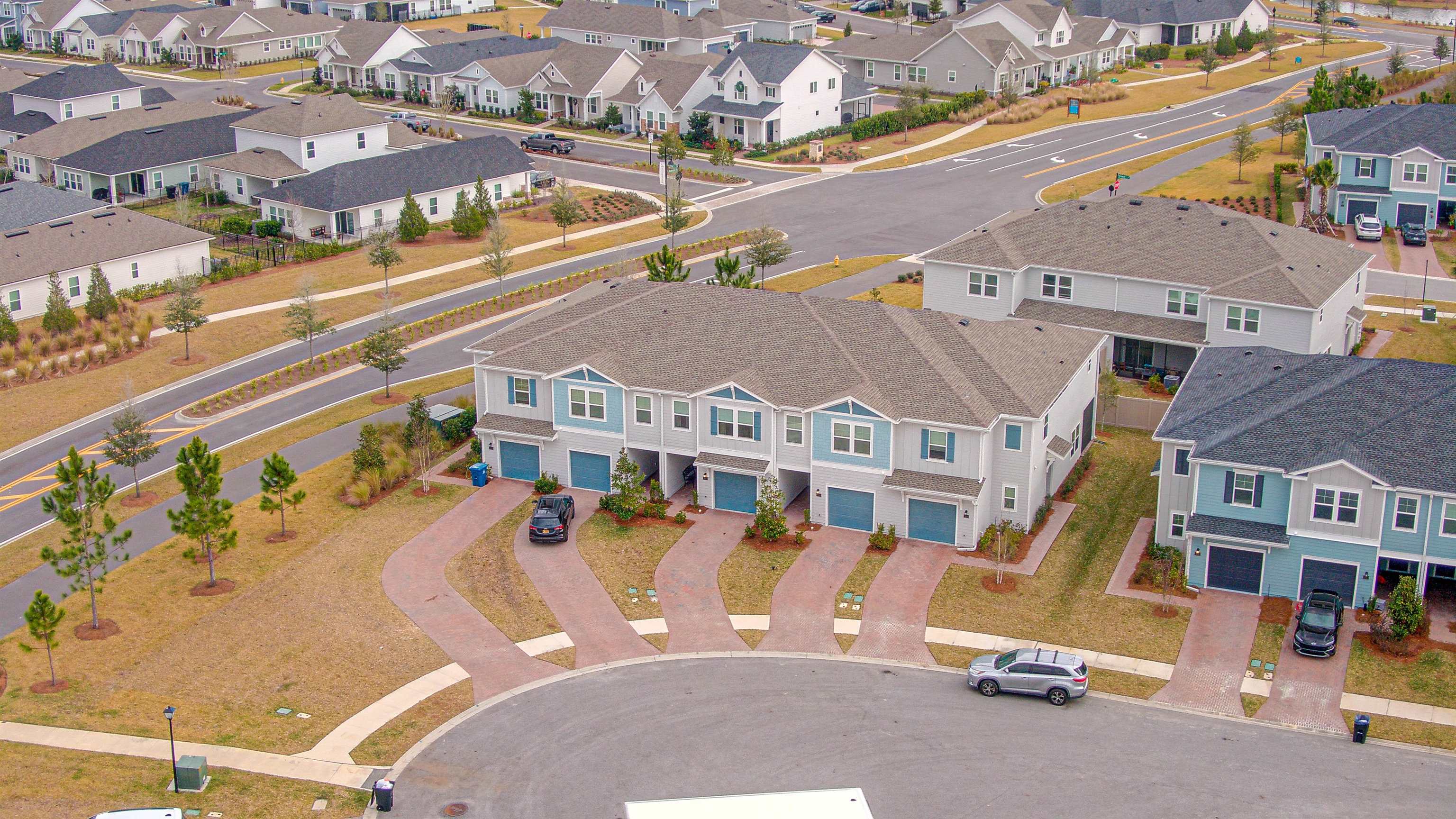 96 Bramble Court St. Augustine, FL 32092 - Photo 44 of 61 an aerial view of residential houses with outdoor space and parking