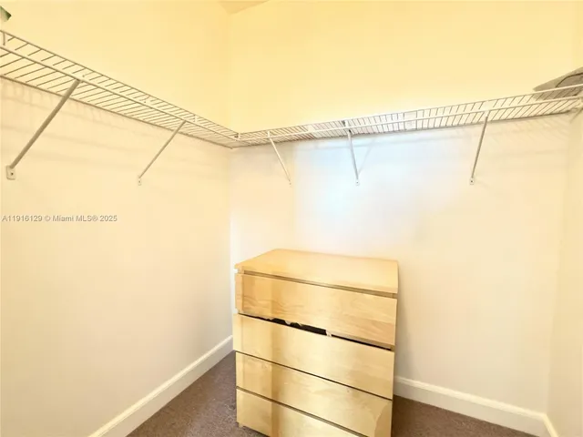 a bathroom with a glass shower