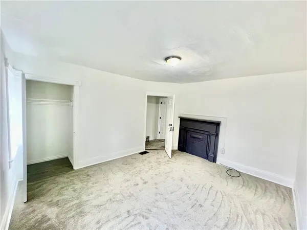 a view of a livingroom with a fireplace