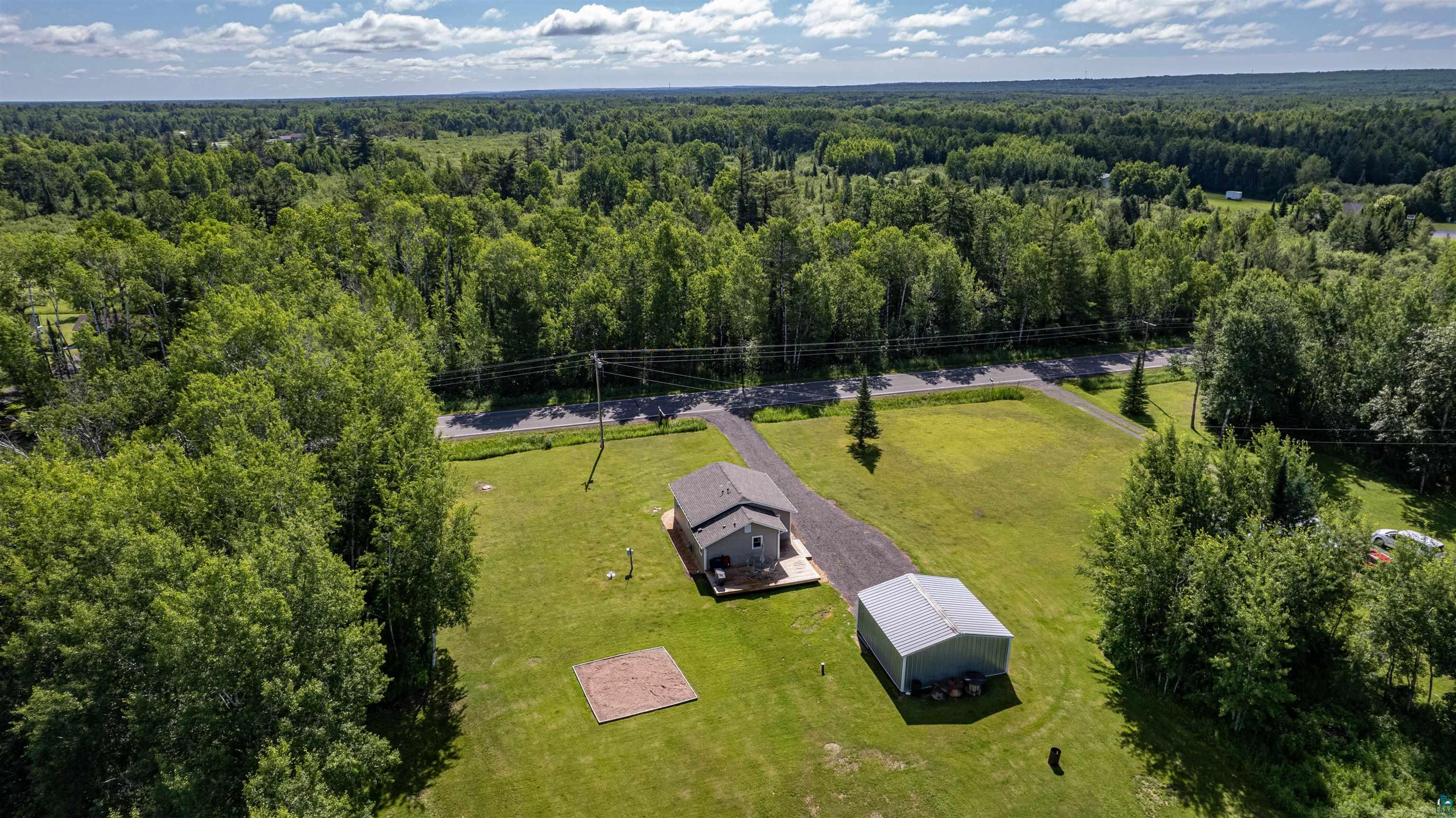 3835 South County Rd K South Range, WI 54874 - Photo 25 of 29 Expansive property with a single-story residence featuring a dark gray roof