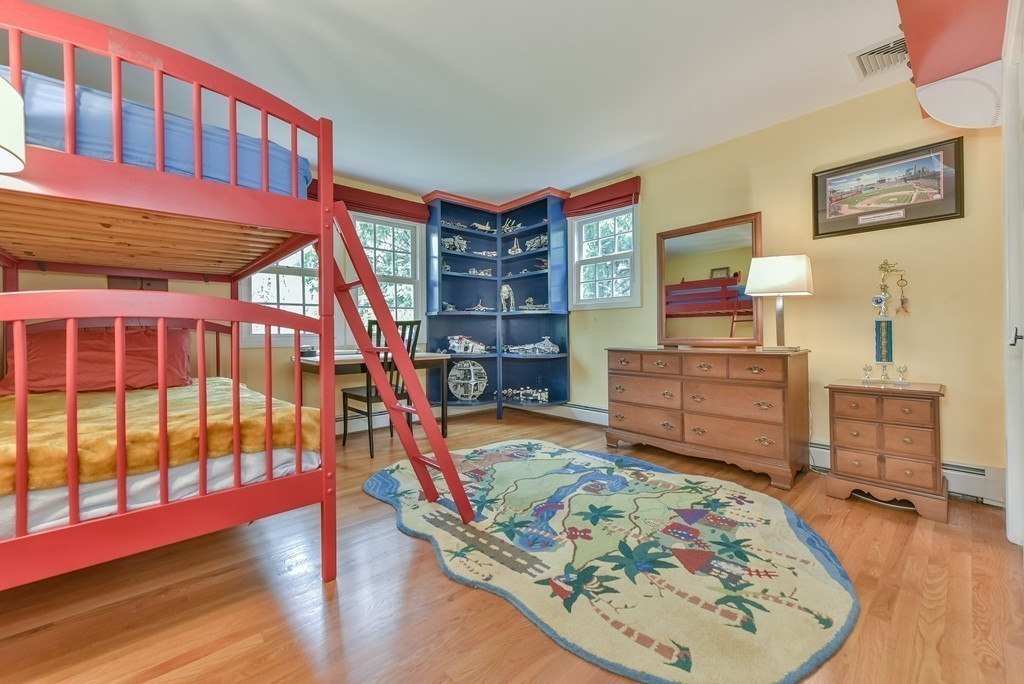 15 Whitney Road Newton, MA 02460 - Photo 18 of 23 a view of a bedroom with furniture and staircase