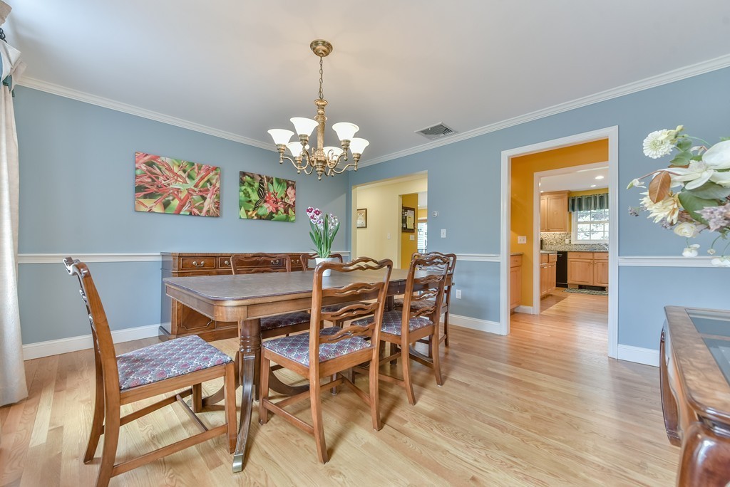 15 Whitney Road Newton, MA 02460 - Photo 6 of 23 a view of a dining room with furniture wooden floor and chandelier