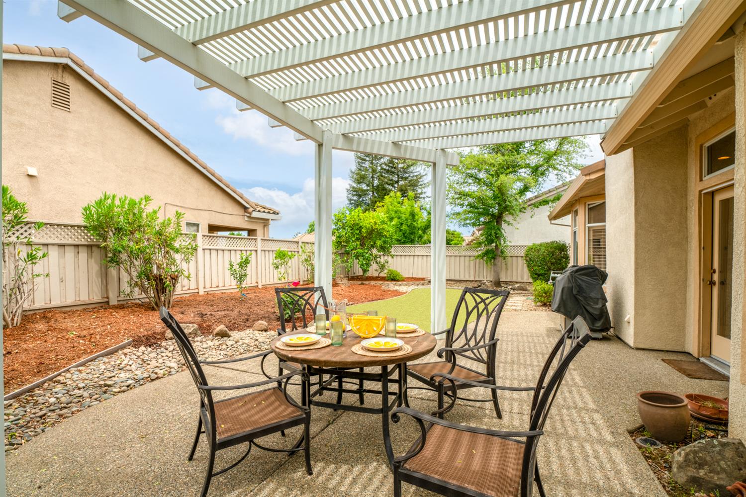 4081 Rose Creek Road Roseville, CA 95747 - Photo 41 of 52 a view of an outdoor sitting area with furniture