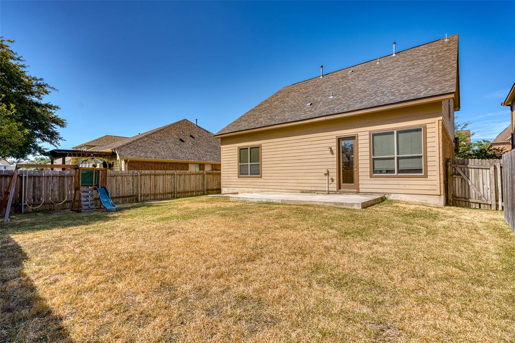 11033 Desert Willow Loop Austin, TX 78748 - Photo 18 of 19 a house with yard in front of it