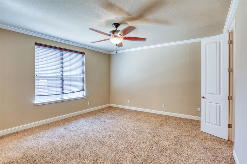 11033 Desert Willow Loop Austin, TX 78748 - Photo 7 of 19 an empty room with windows and fan