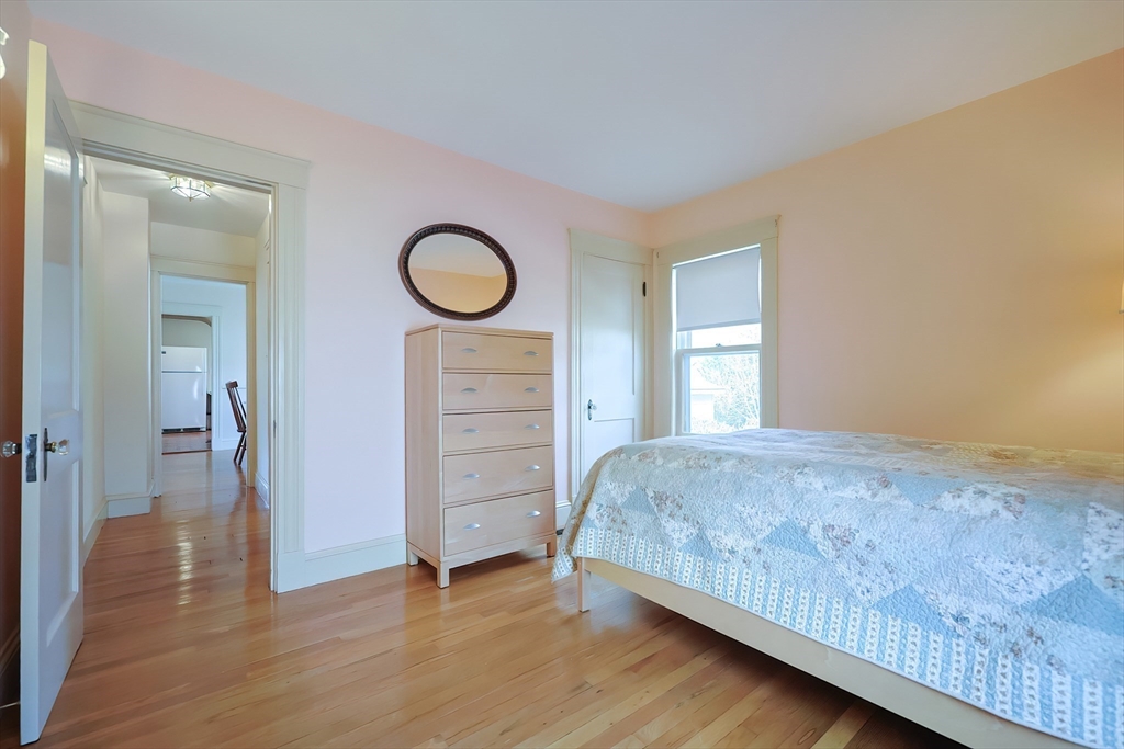 32 Sexton Avenue Westwood, MA 02090 - Photo 19 of 33 a bedroom with a bed and a window
