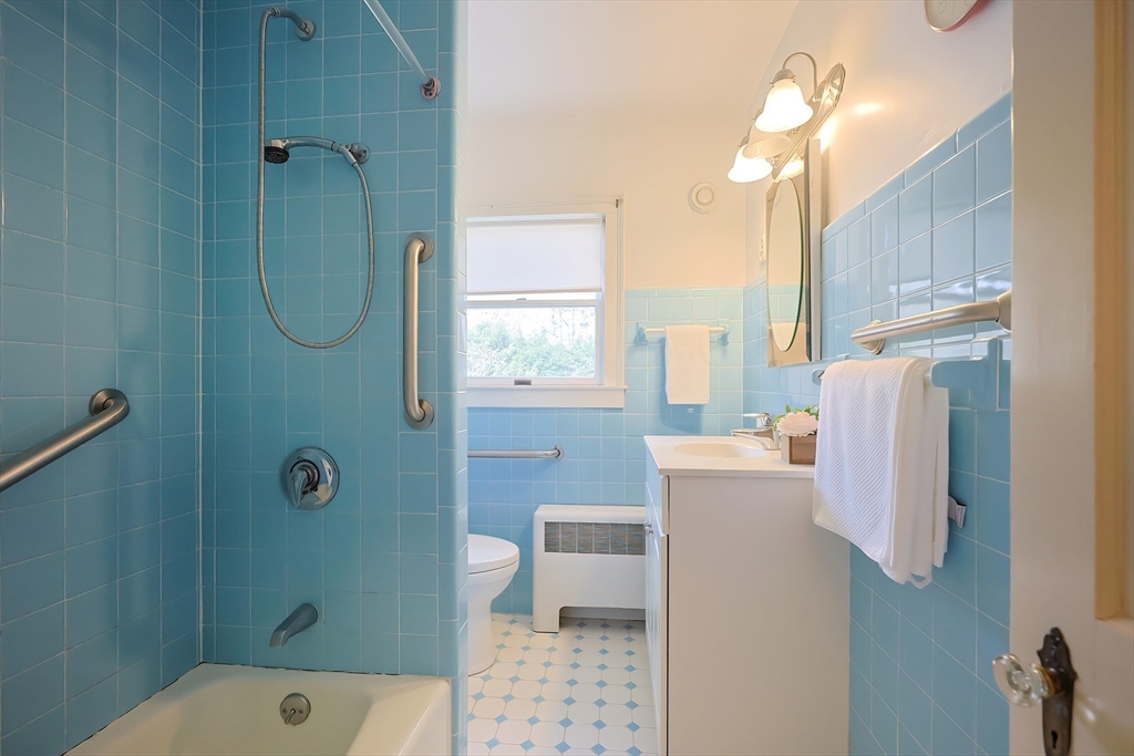 32 Sexton Avenue Westwood, MA 02090 - Photo 21 of 33 a bathroom with a shower toilet and sink