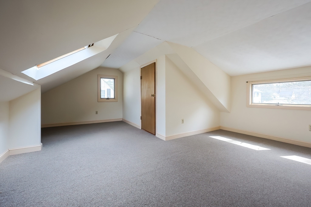 32 Sexton Avenue Westwood, MA 02090 - Photo 23 of 33 a view of an empty room with a window