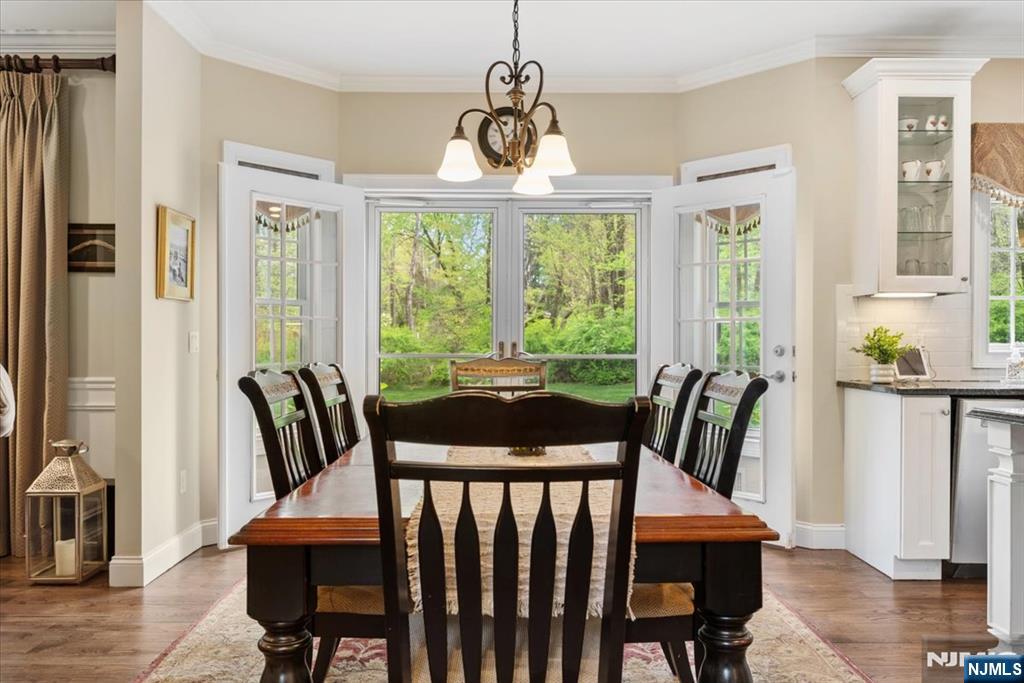 8 Forest Drive Mendham, NJ 07945 - Photo 12 of 43 a view of a dining room with furniture window and wooden floor