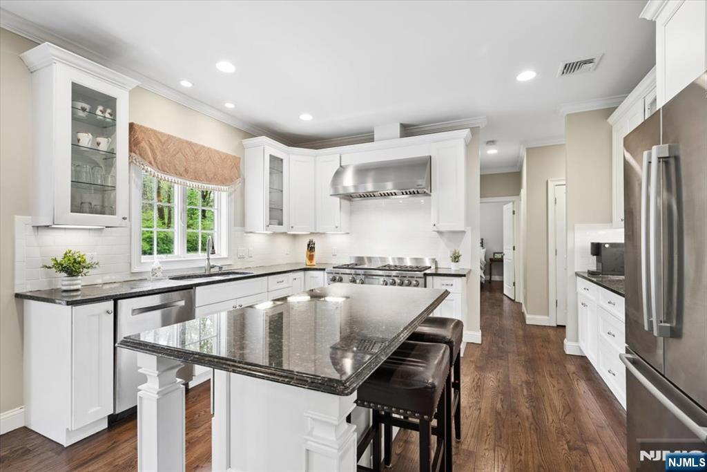 8 Forest Drive Mendham, NJ 07945 - Photo 13 of 43 a large kitchen with lots of counter space and window