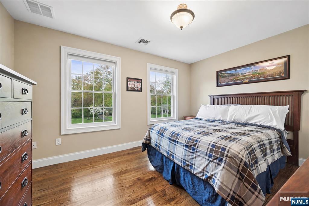 8 Forest Drive Mendham, NJ 07945 - Photo 28 of 43 a bedroom with bed and a window