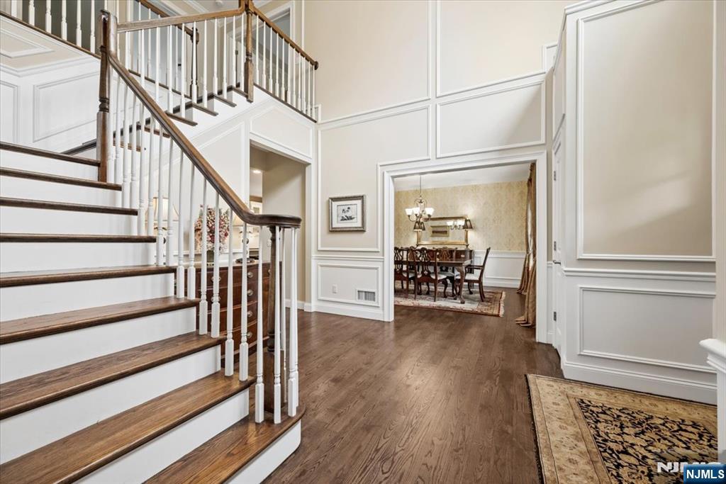 8 Forest Drive Mendham, NJ 07945 - Photo 4 of 43 a view of front door with wooden floor and a rug