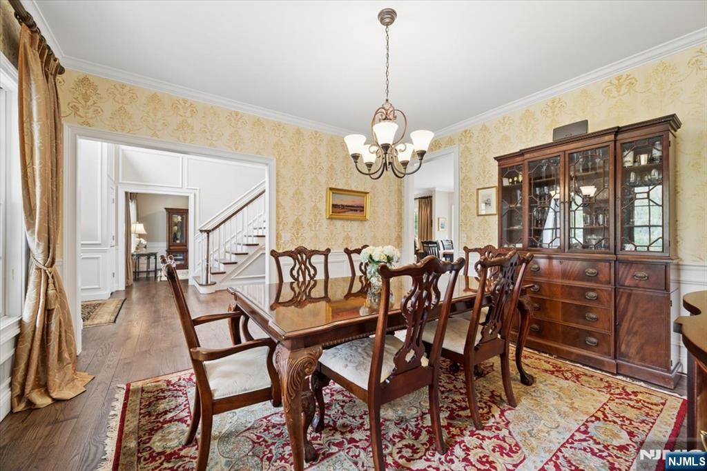 8 Forest Drive Mendham, NJ 07945 - Photo 5 of 43 a view of a dining room with furniture and chandelier
