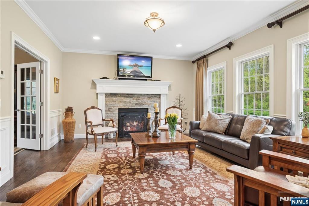 8 Forest Drive Mendham, NJ 07945 - Photo 10 of 43 a living room with furniture and a fireplace