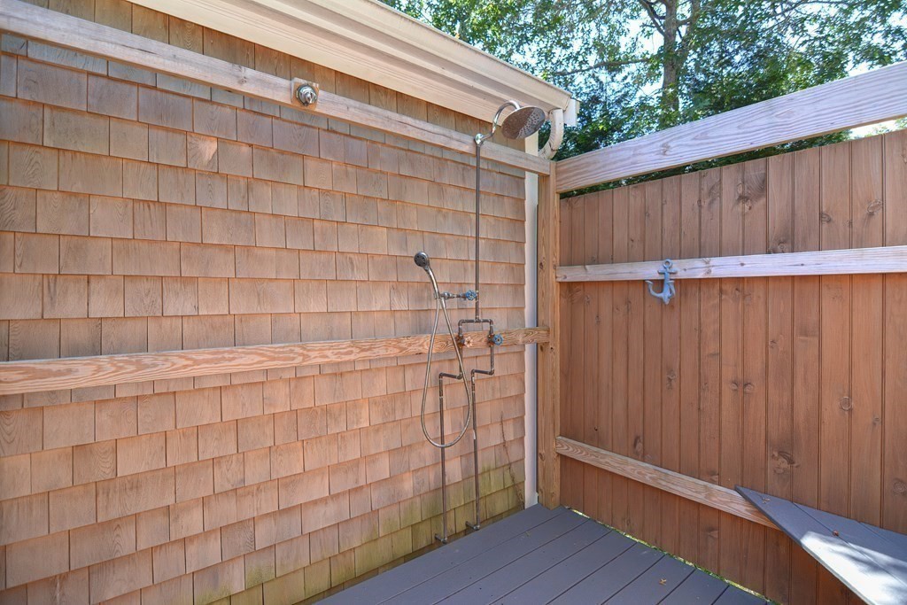 61 Tarpon Road Falmouth, MA 02536 - Photo 12 of 42 a view of outdoor space with wooden walls