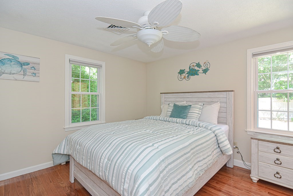 61 Tarpon Road Falmouth, MA 02536 - Photo 34 of 42 a bedroom with a bed and a window