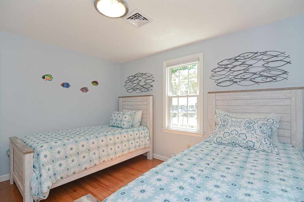 61 Tarpon Road Falmouth, MA 02536 - Photo 40 of 42 a bedroom with a bed and a window