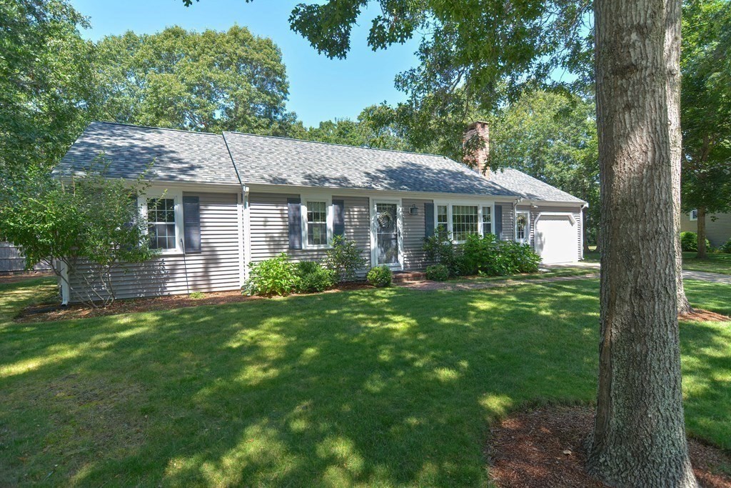 61 Tarpon Road Falmouth, MA 02536 - Photo 4 of 42 a house view with a garden space