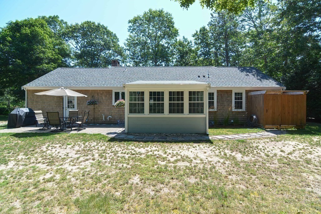 61 Tarpon Road Falmouth, MA 02536 - Photo 9 of 42 a house view with a garden space