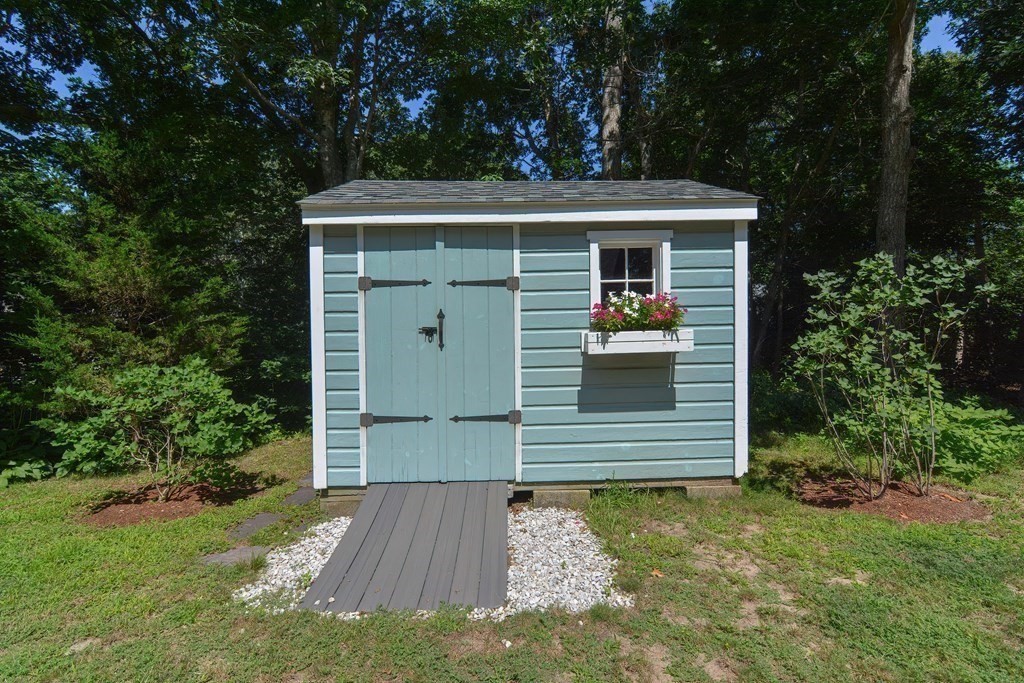 61 Tarpon Road Falmouth, MA 02536 - Photo 10 of 42 front view of a house with a yard