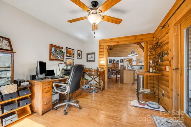 a work room with furniture and a window