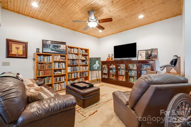 a living room with a couch and a flat screen tv