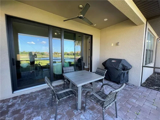 a view of a livingroom with furniture and a table