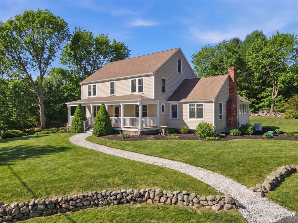24 Ridge Hill Road Scituate, MA 02066 - Photo 3 of 38 a front view of a house with a yard