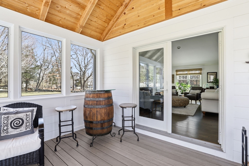 24 Ridge Hill Road Scituate, MA 02066 - Photo 31 of 38 a living room with furniture and a gate