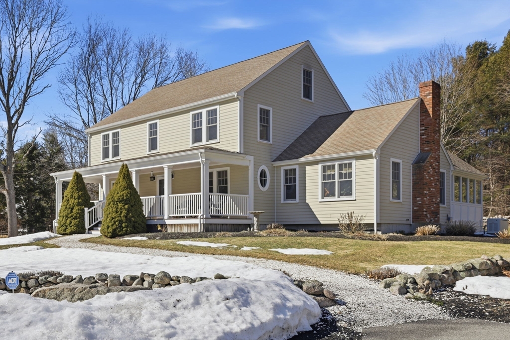 24 Ridge Hill Road Scituate, MA 02066 - Photo 4 of 38 a front view of a house with a yard