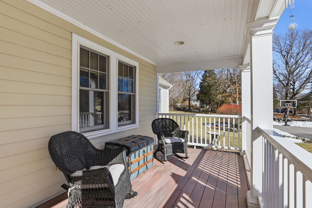 24 Ridge Hill Road Scituate, MA 02066 - Photo 5 of 38 a view of a chair and table on the deck