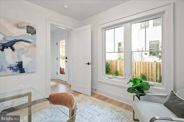a view of entryway with wooden floor