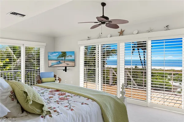 a bedroom that has a bed and a window