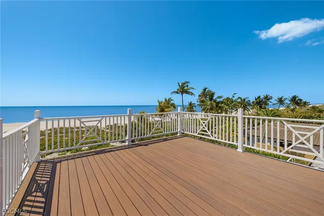 a view of balcony with wooden floor