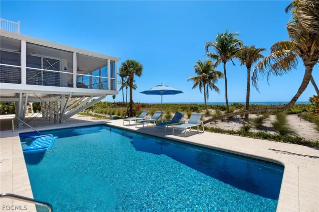 a view of a backyard with a tub and trees