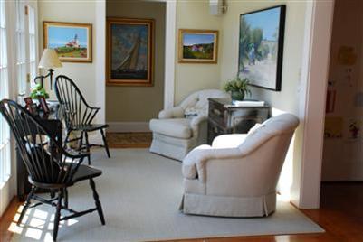 270 Stage Harbor Road Chatham, MA 02633 - Photo 11 of 21 a living room with furniture and a potted plant