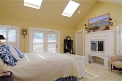 270 Stage Harbor Road Chatham, MA 02633 - Photo 12 of 21 a bedroom with a bed and a couch