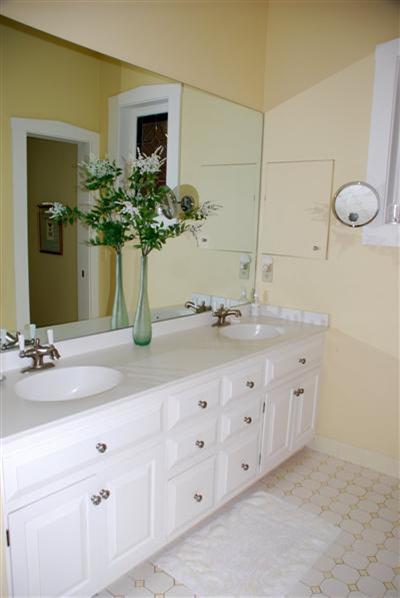 270 Stage Harbor Road Chatham, MA 02633 - Photo 14 of 21 a bathroom with a double vanity sink and a mirror