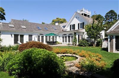 270 Stage Harbor Road Chatham, MA 02633 - Photo 3 of 21 a view of a yard in front of house