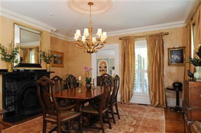 270 Stage Harbor Road Chatham, MA 02633 - Photo 4 of 21 a view of a dining room with furniture and a chandelier