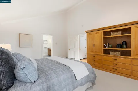 a view of a balcony with chair and potted plant