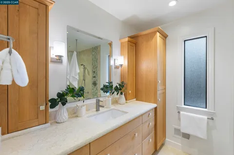 an aerial view of a house with a garden