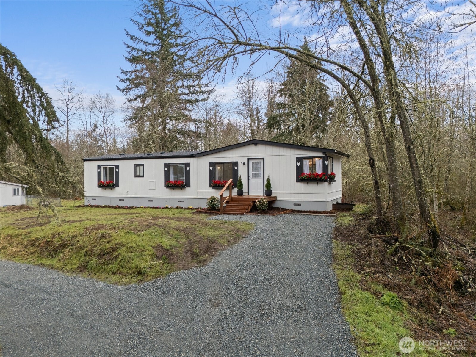 14512 246th Street East Graham, WA 98338 - Photo 14 of 17 front view of a house with a yard